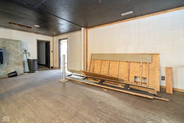 basement featuring hardwood / wood-style flooring