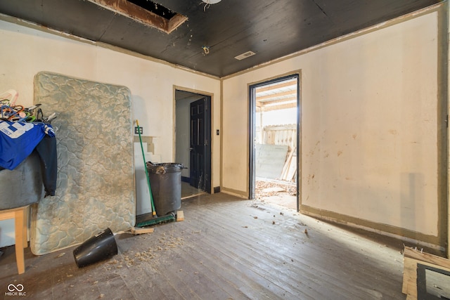 unfurnished room featuring hardwood / wood-style flooring