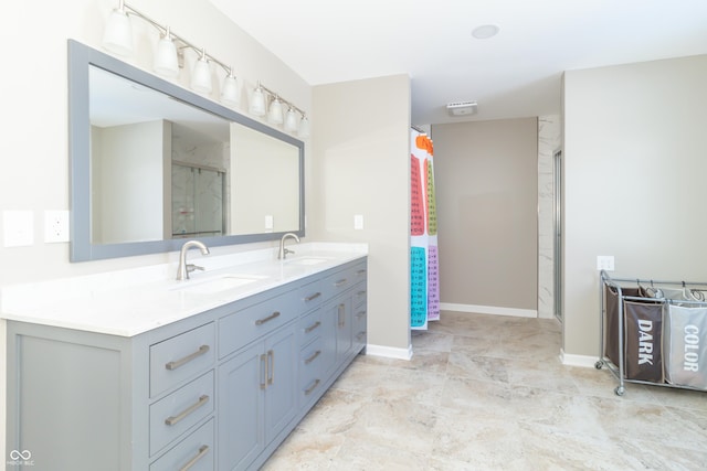 bathroom featuring vanity and a shower