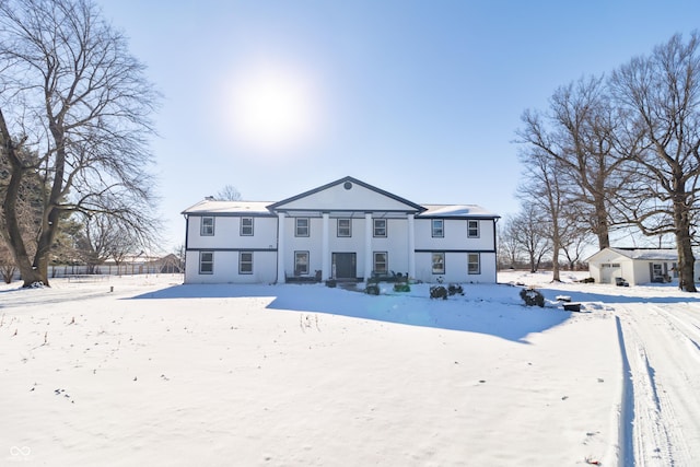 view of snow covered house