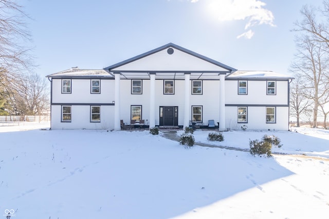 view of snow covered house