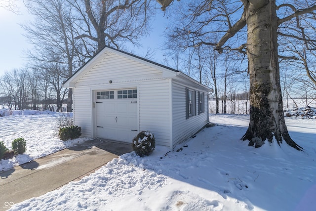 view of snow covered garage