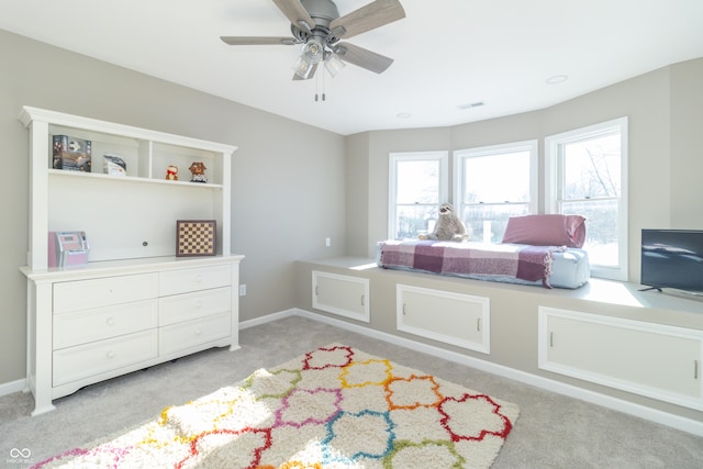 carpeted bedroom featuring ceiling fan