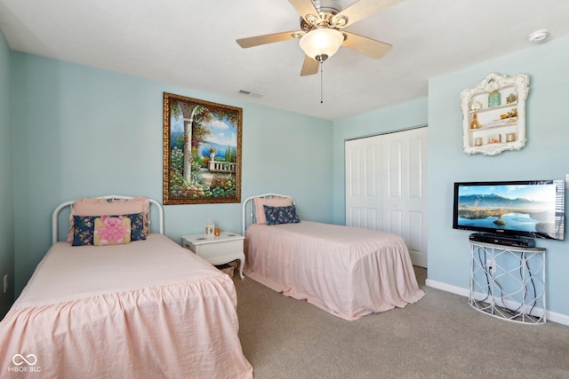 bedroom featuring carpet floors, a closet, and ceiling fan