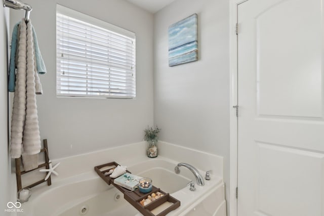 bathroom featuring a bath