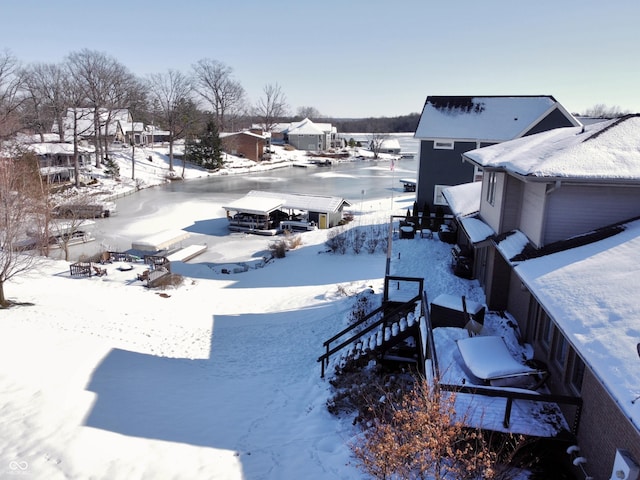 view of yard covered in snow