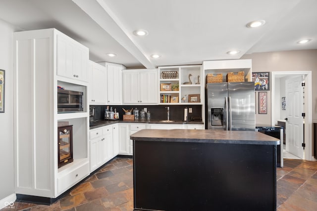 kitchen featuring stone tile floors, open shelves, stainless steel appliances, dark countertops, and recessed lighting