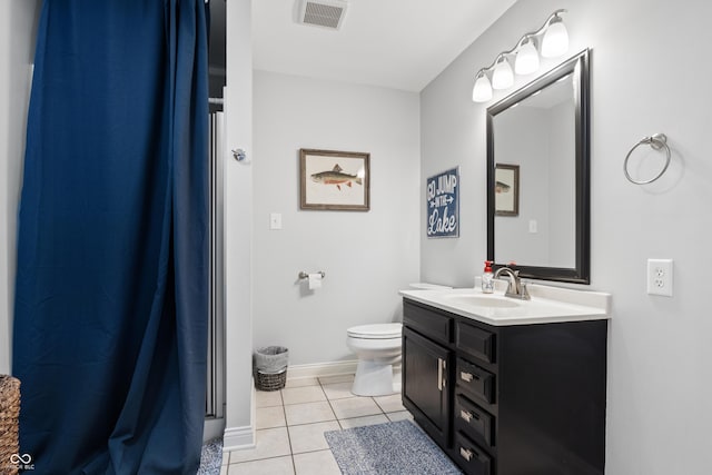 bathroom featuring visible vents, toilet, a shower with curtain, tile patterned floors, and vanity