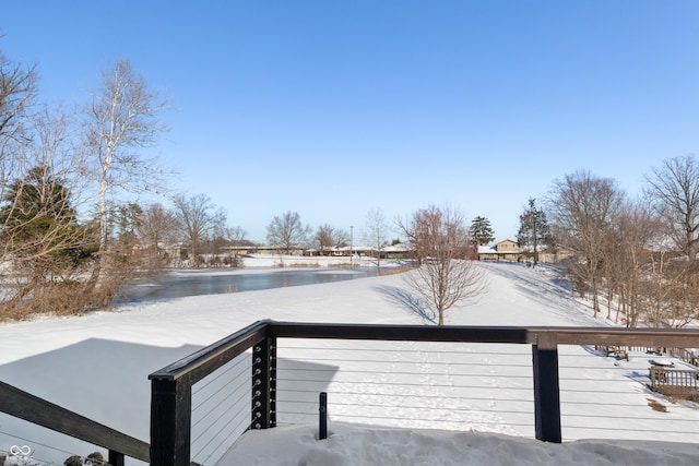 view of snow covered deck