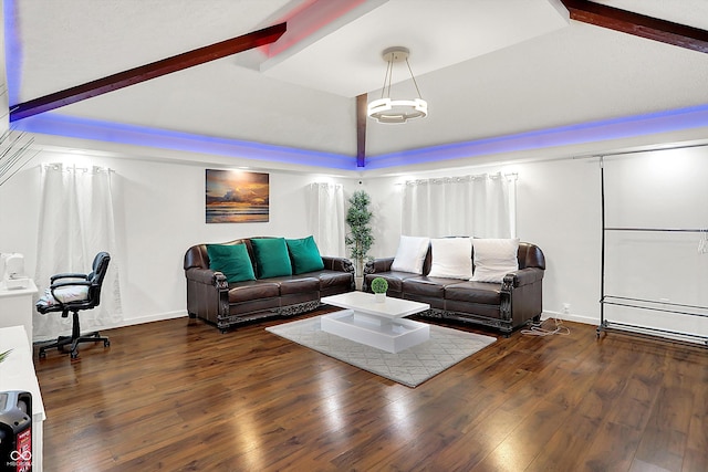 living room with dark wood-type flooring and lofted ceiling with beams