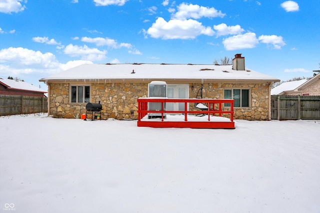 view of snow covered property