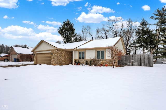 single story home with a garage