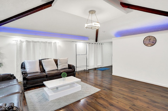 living room featuring dark wood-type flooring and vaulted ceiling with beams