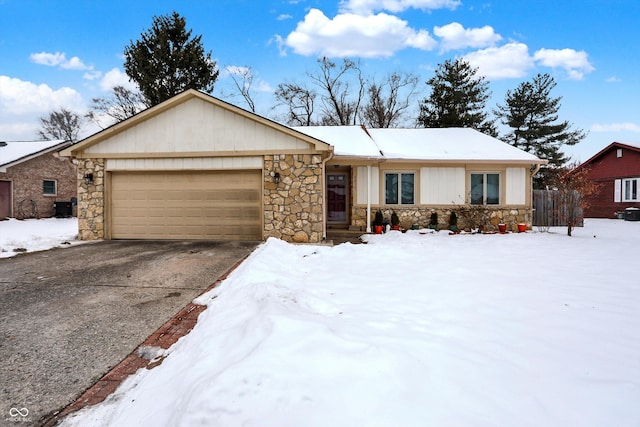 ranch-style home with a garage