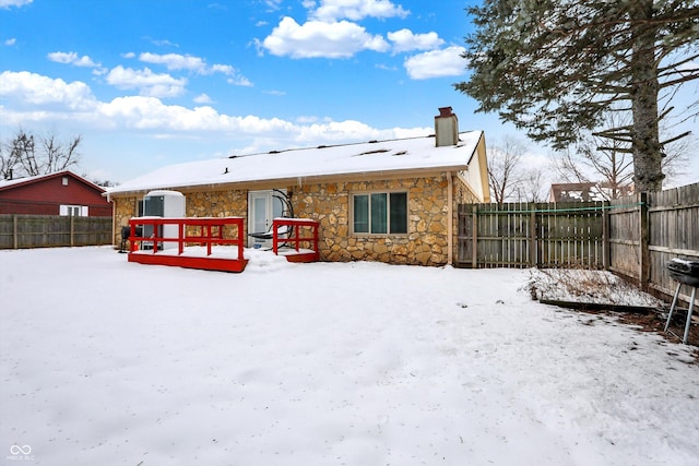 view of snow covered house