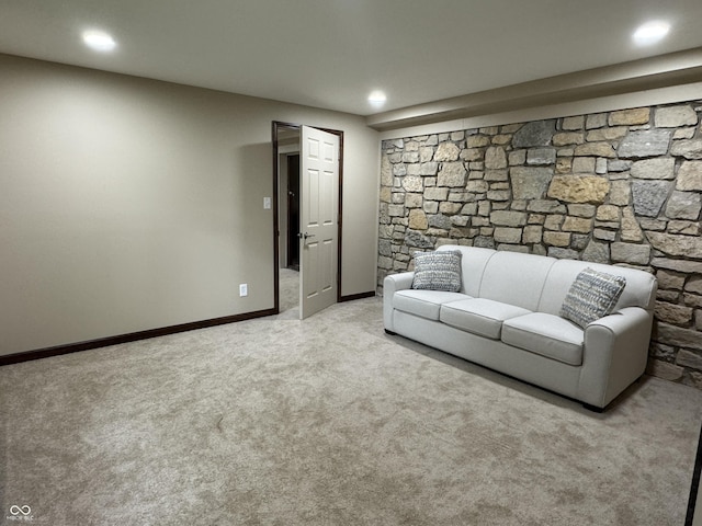 unfurnished living room featuring light carpet