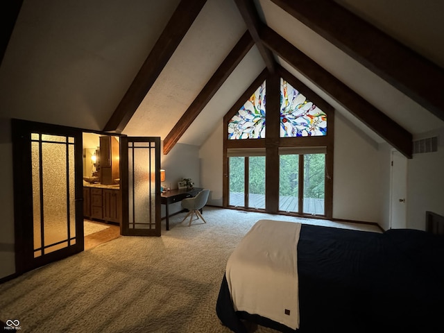 bedroom featuring beamed ceiling, high vaulted ceiling, ensuite bath, and carpet floors