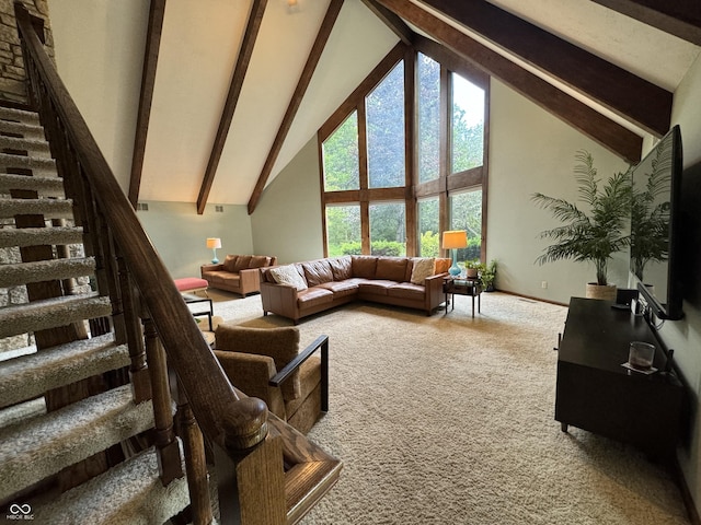 living room with high vaulted ceiling, carpet flooring, and beam ceiling