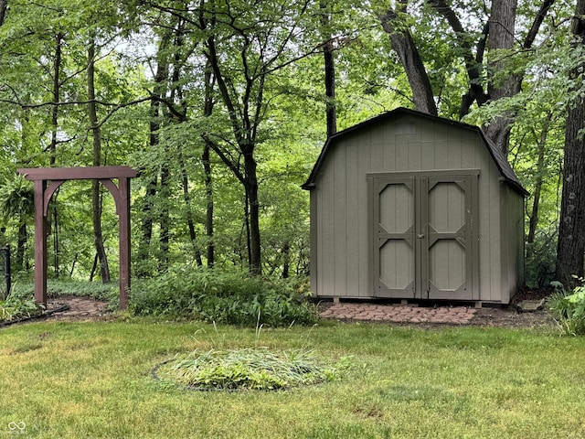 view of outdoor structure with a lawn