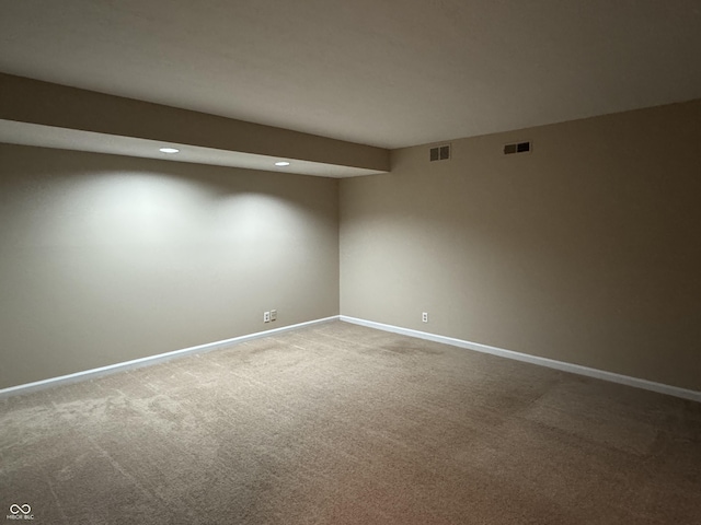 spare room featuring carpet floors