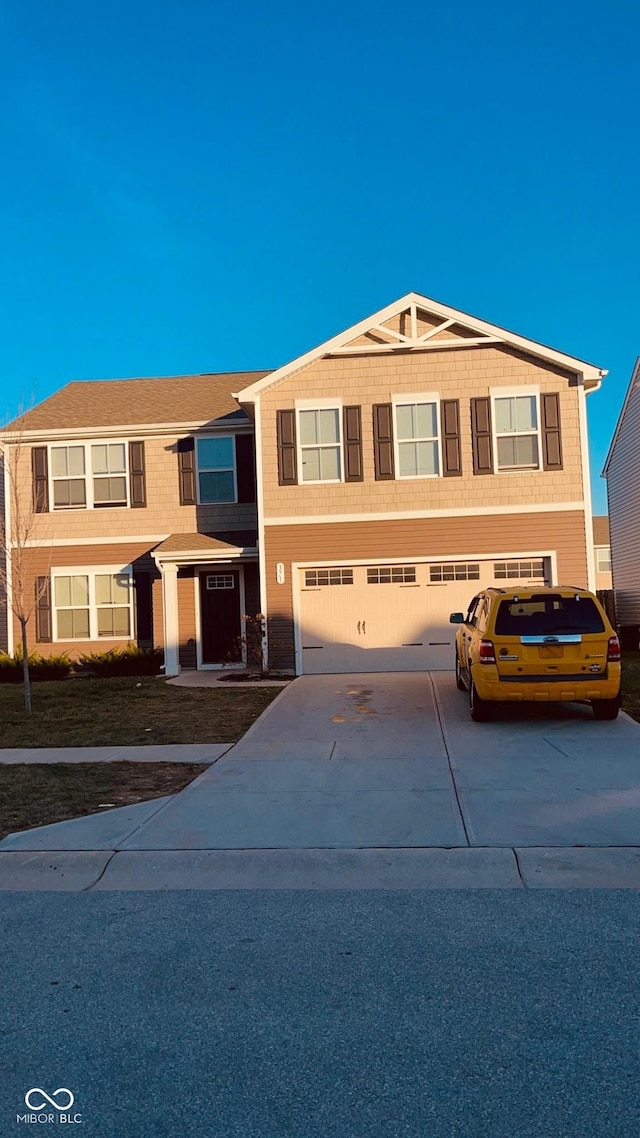 view of front of property featuring a garage