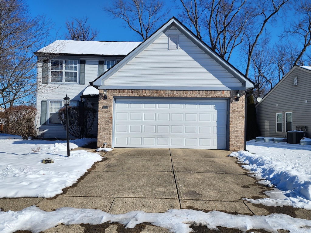 front of property featuring central AC unit