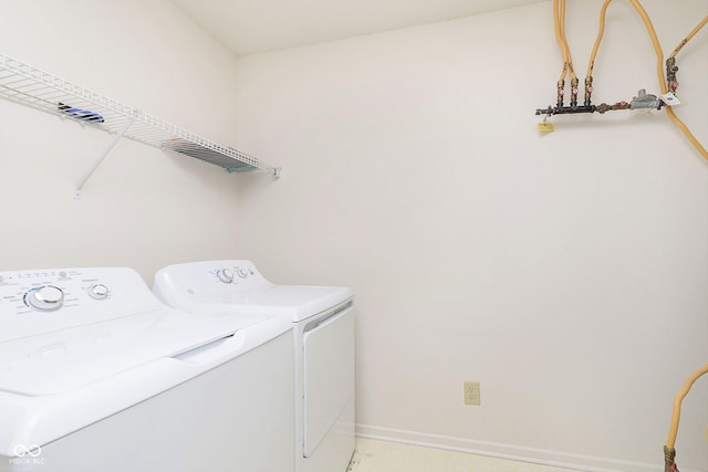 washroom featuring separate washer and dryer