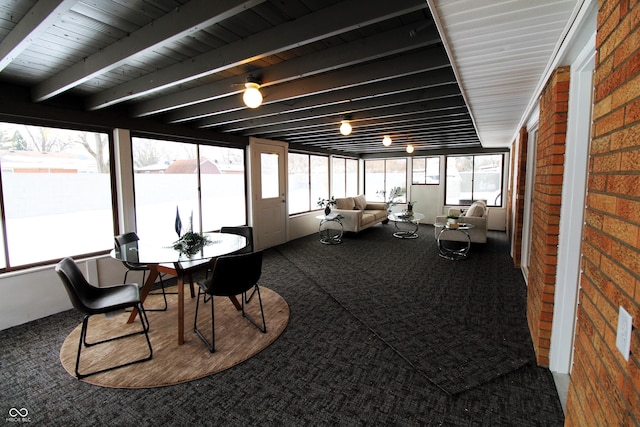 sunroom / solarium with beamed ceiling