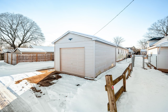 view of snow covered garage