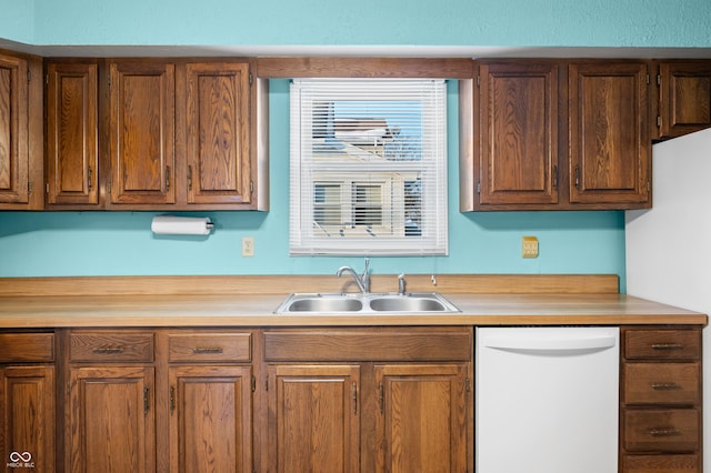 kitchen featuring dishwasher and sink