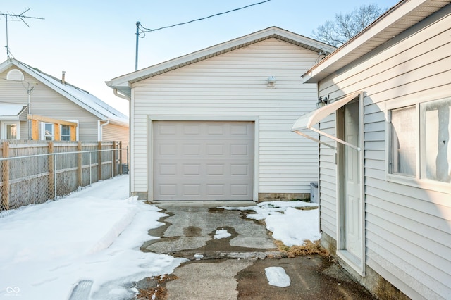 view of snow covered garage