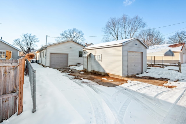 view of snow covered garage