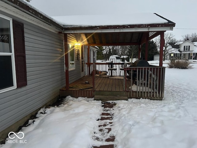 view of snow covered deck