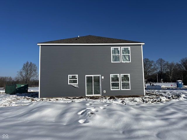 view of snow covered property