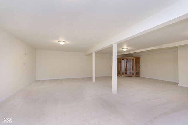 basement with light carpet