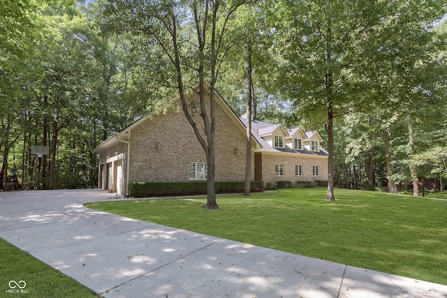 view of front facade with a front lawn and a garage