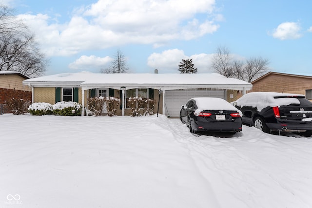 ranch-style home with a garage