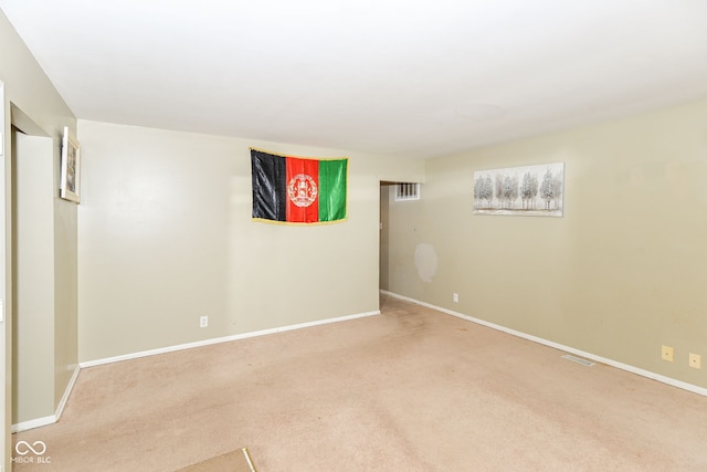 unfurnished room featuring carpet floors