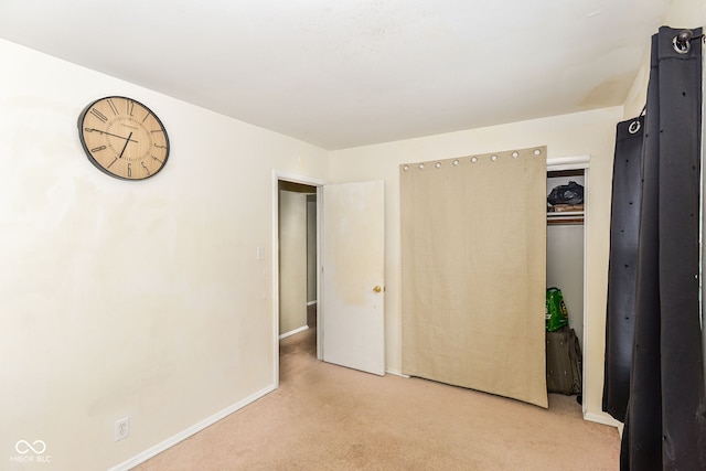 unfurnished bedroom with light carpet