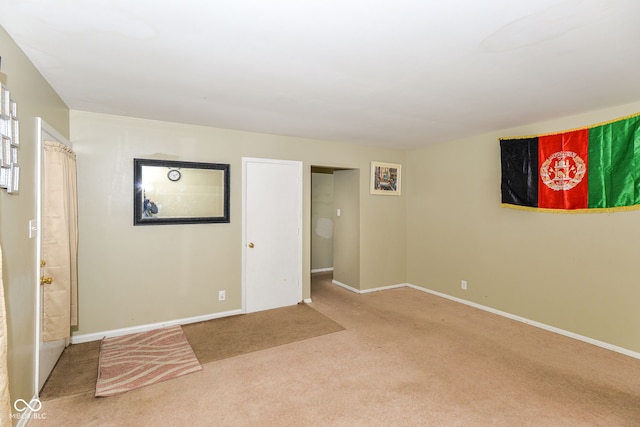 unfurnished room with carpet