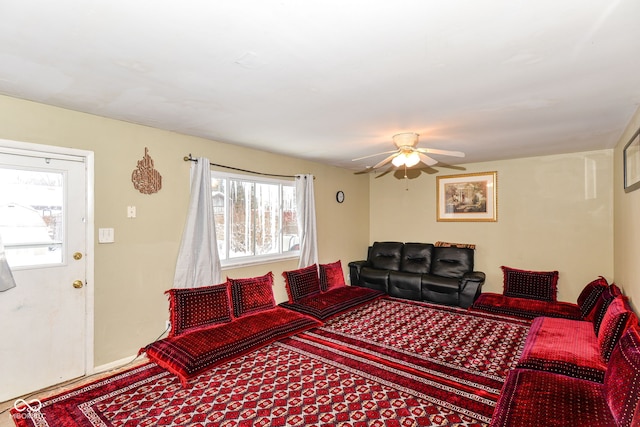 living room featuring ceiling fan