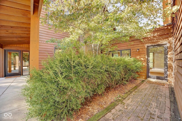 view of home's exterior with a patio area