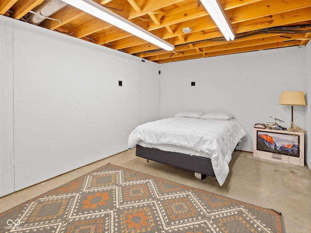 bedroom with concrete floors