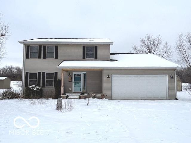 view of front of home with a garage