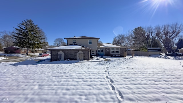 view of snow covered property