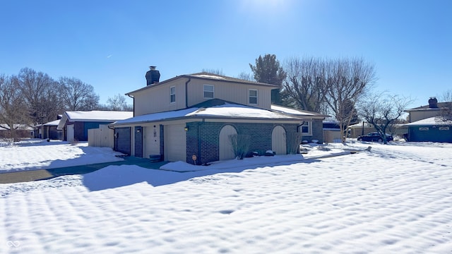 view of snow covered property