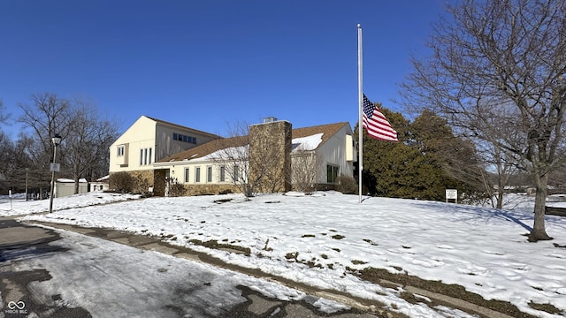 view of snow covered property