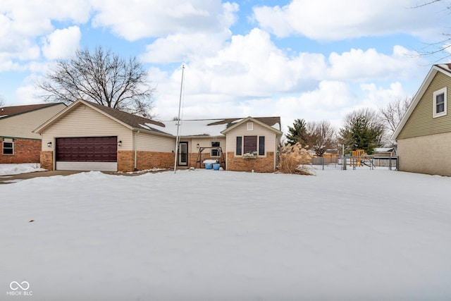 single story home with a garage