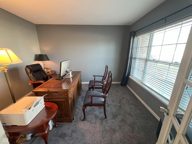 office area featuring dark carpet