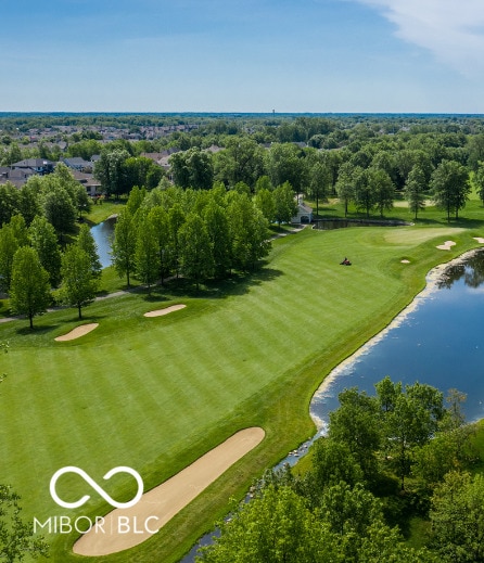 surrounding community featuring a water view